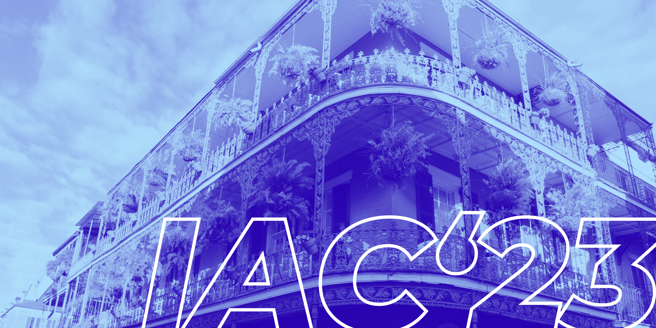 IAC'23 in white outline capitals on a bright blue negative image of a New Orleans balcony